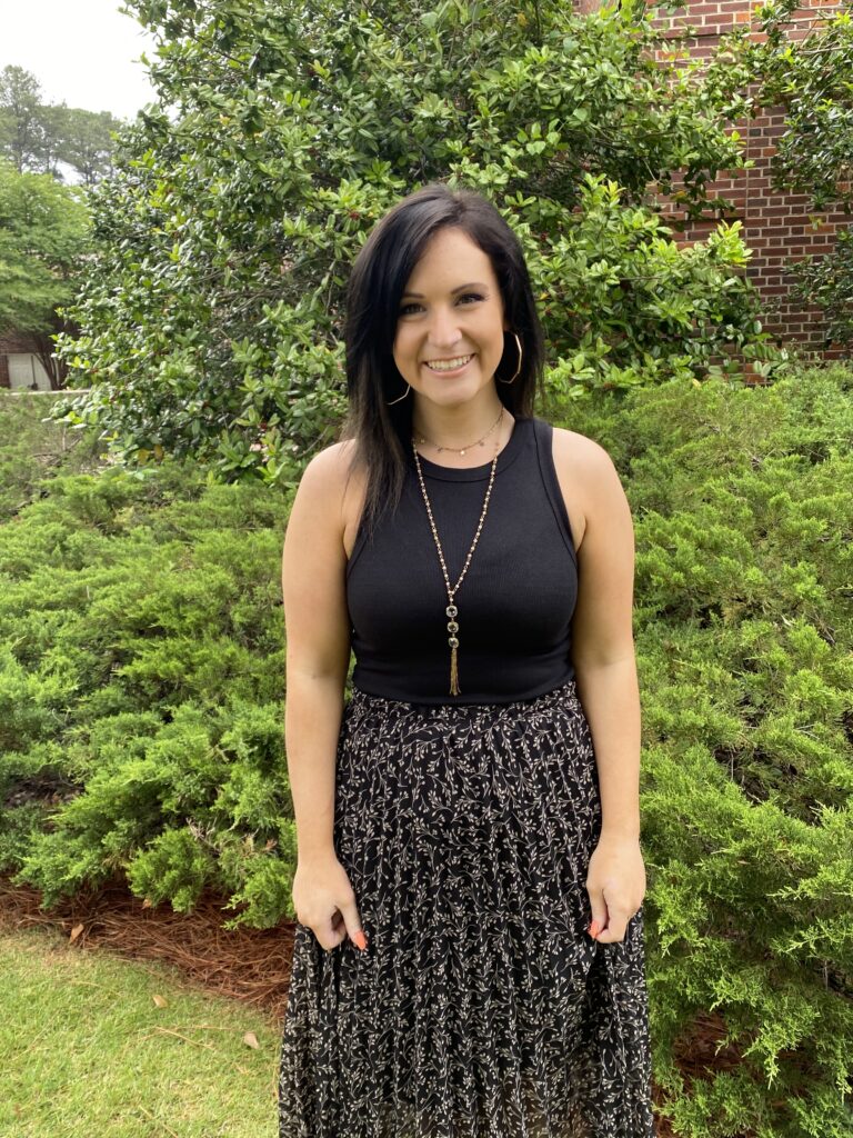 Photo of 2021 Aspireship grad Kellie Tyler Nelson, for her Aspireship Success Story blog about her career path from retail sales, to life insurance to a career change to a SDR role in SaaS sales, after graduating from the Aspireship SaaS sales foundations online training course.